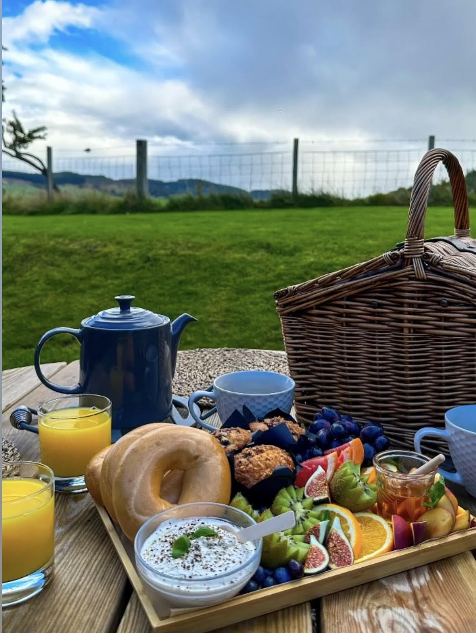 Breakfast Grazing Box. Filled with fresh fruit, bagels, soft cheese, fresh cakes or pastries. 