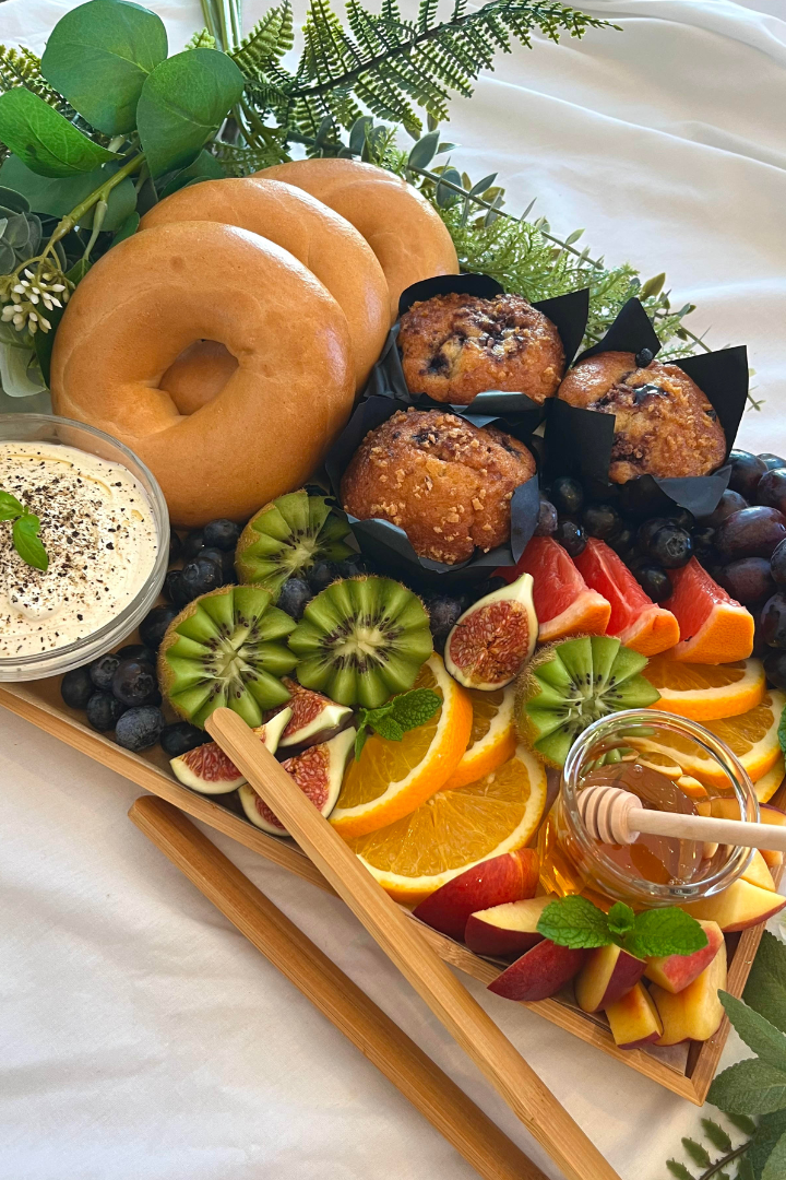 Breakfast grazing box, selection of fresh fruit, bagels, soft cheese and pastries or cakes. Edinburgh Catering. 